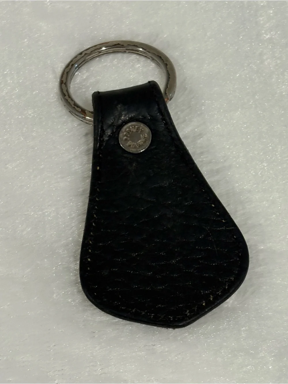 Dooney & Bourke Black and Brown Leather Key Fob with Brass Duck Medallion